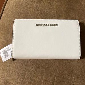Michael Kors jet set travel wallet.